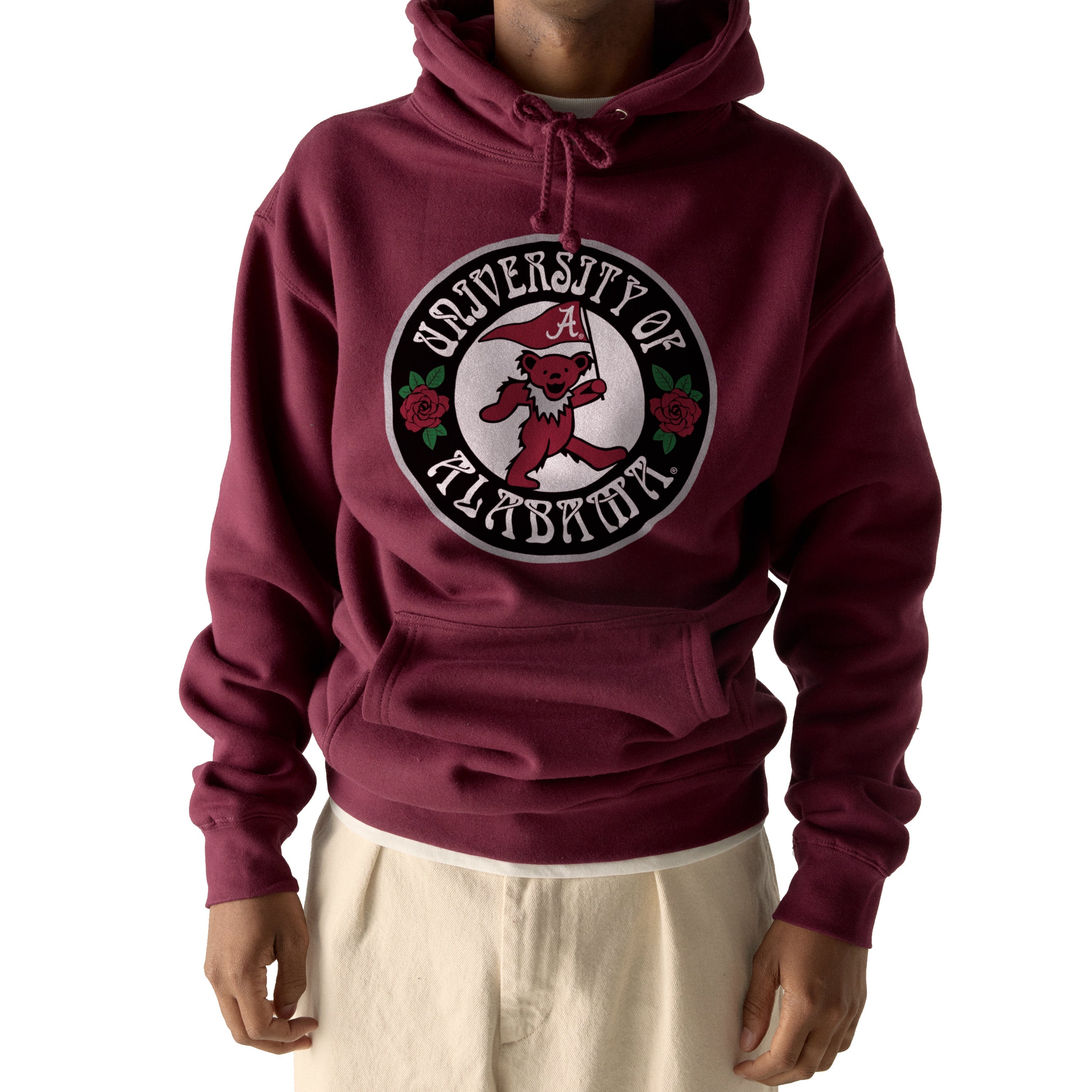 Man wearing maroon University of Alabama hoodie with bear and rose graphic. Class Trip | Officially Licensed Collegiate Apparel