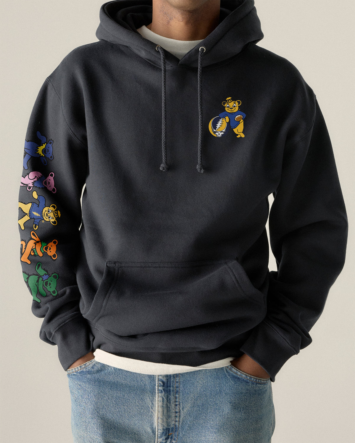 Model wearing the Navy Cal Berkeley x Grateful Dead Grateful Bears Hoodie, front view. Class Trip | Higher Education