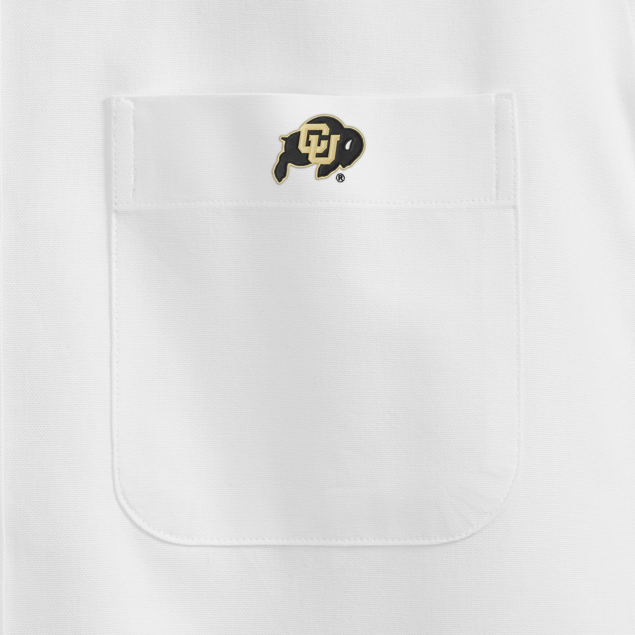 White oxford shirt chest pocket with collegiate buffalo logo. Class Trip | Officially Licensed Collegiate Apparel