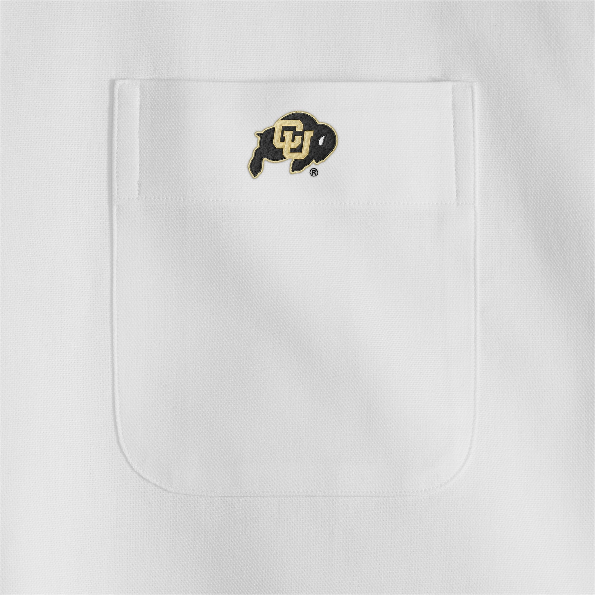 White women's oxford shirt pocket with Colorado Buffaloes logo. Class Trip | Officially Licensed Collegiate Apparel