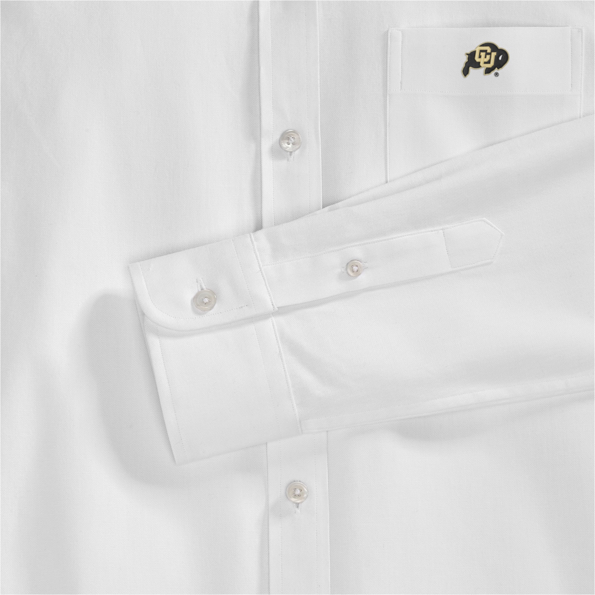 White women's oxford shirt with campus logo on pocket, button details visible. Class Trip | Officially Licensed Collegiate Apparel