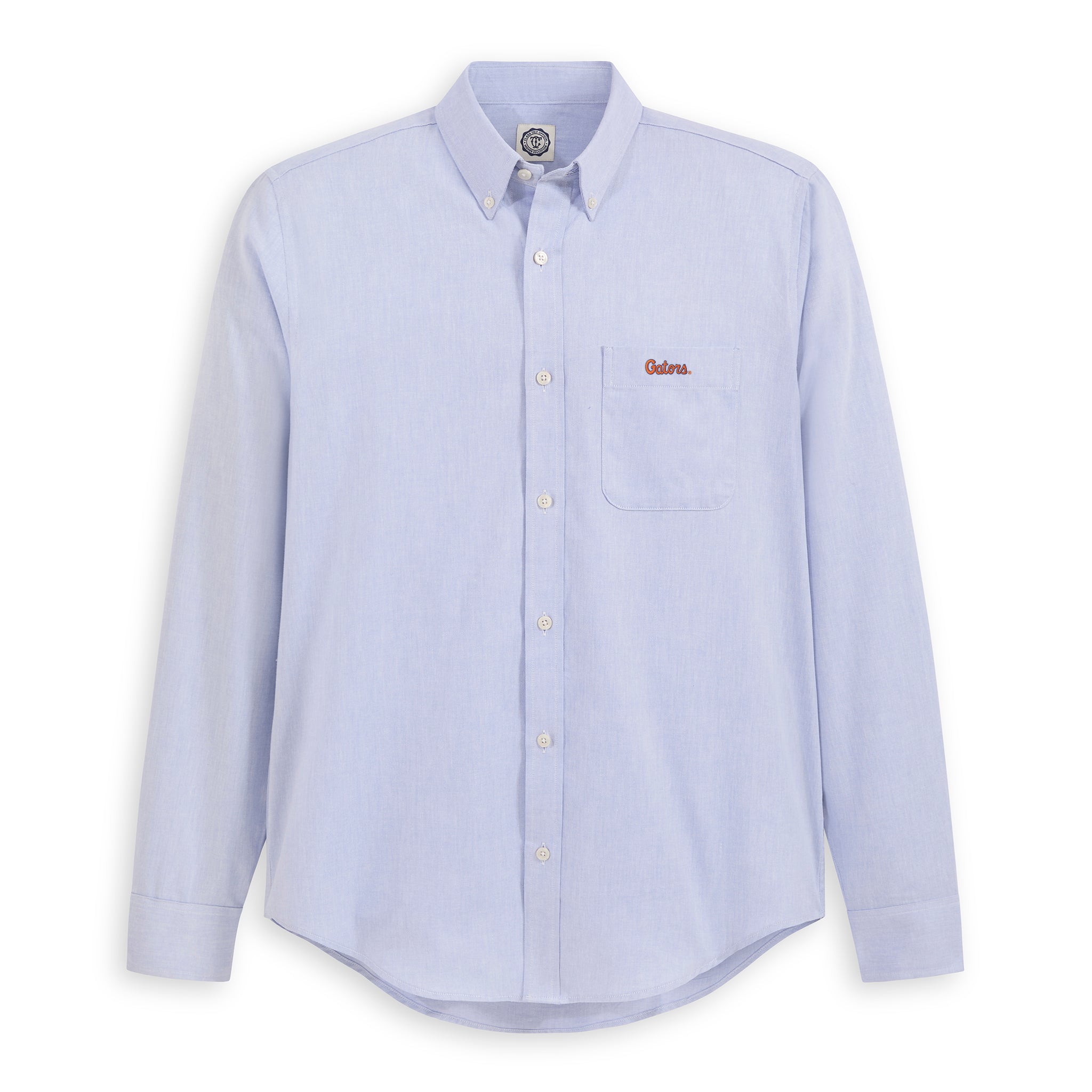 Men's light blue oxford shirt with embroidered collegiate logo on chest pocket, long sleeves, button-down collar. Class Trip | Officially Licensed Collegiate Apparel