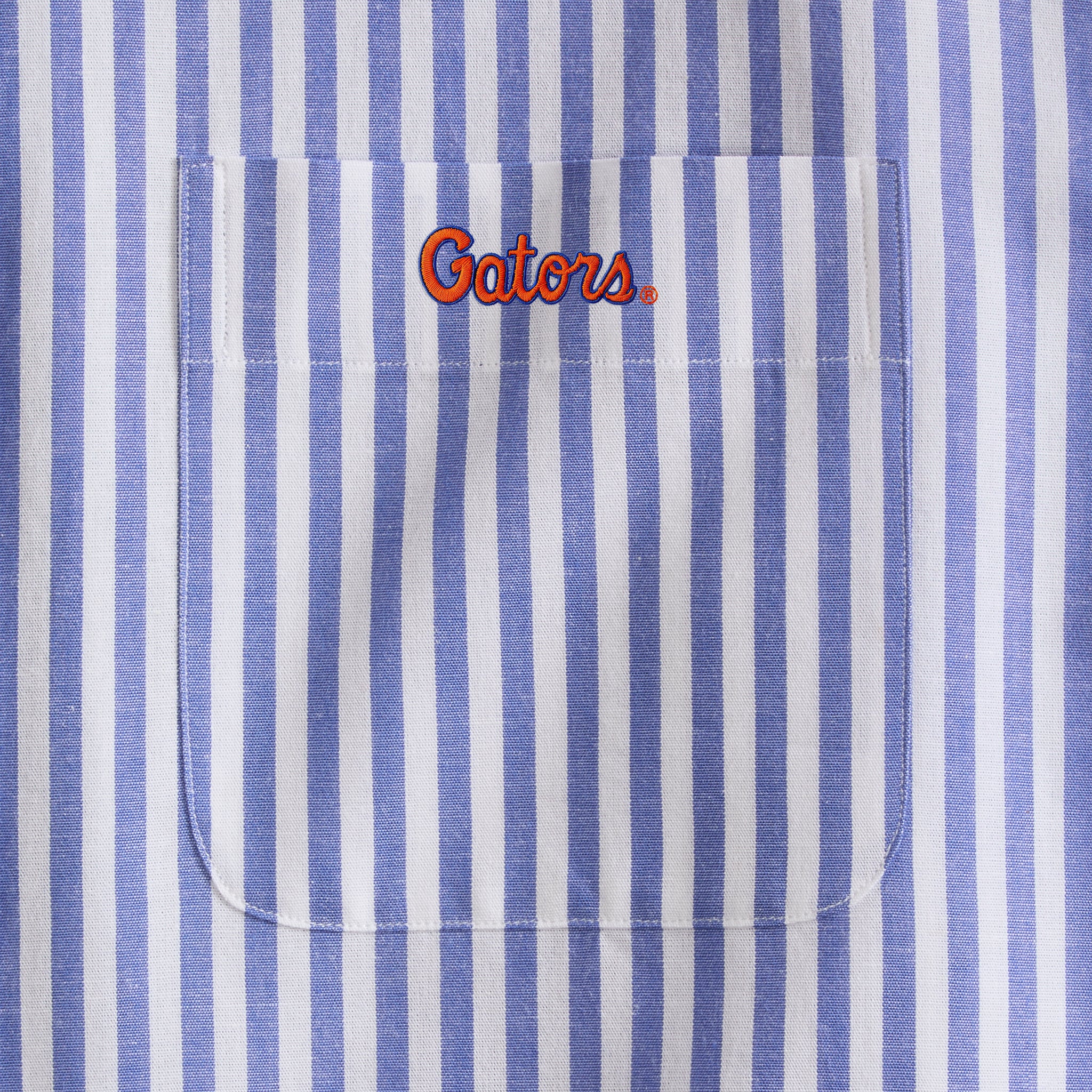 Blue and white striped men's shirt pocket with Gators embroidery logo, Class Trip | Officially Licensed Collegiate Apparel