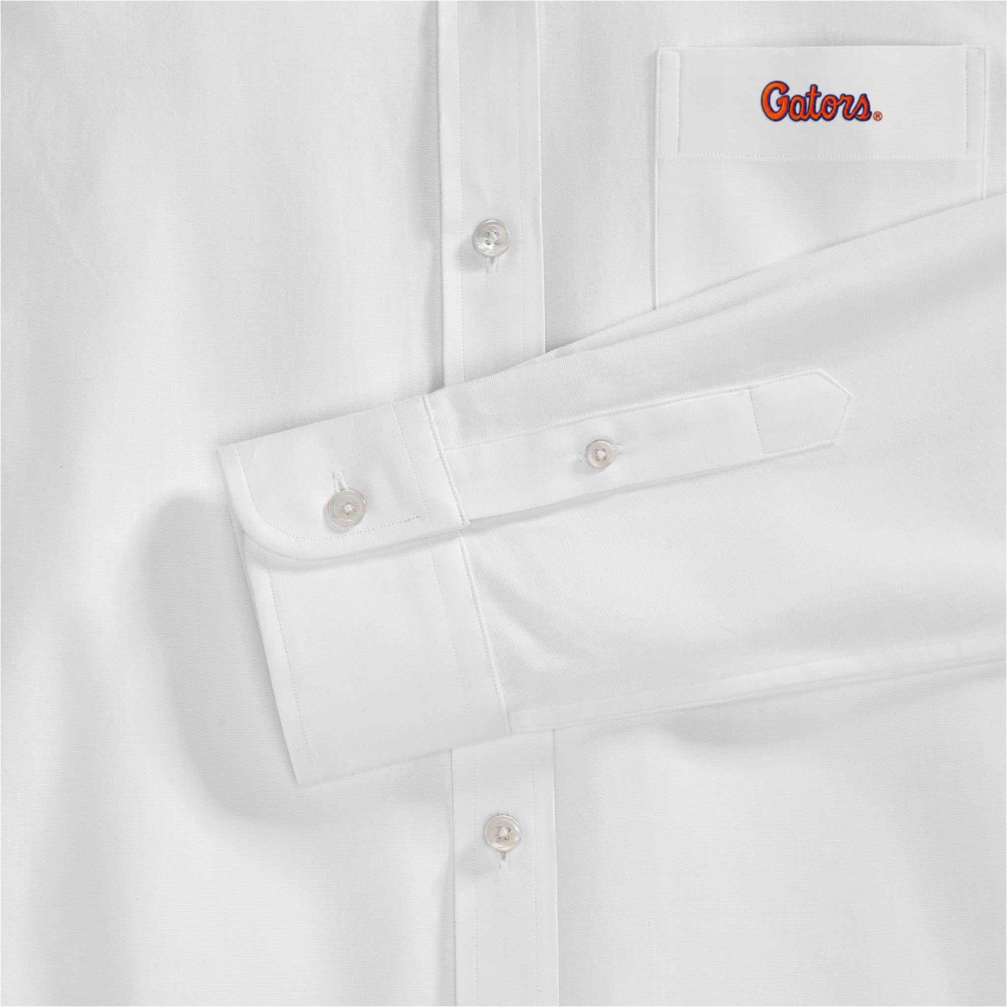 Women's white oxford button-down shirt with embroidered Gators logo on pocket. Class Trip | Officially Licensed Collegiate Apparel