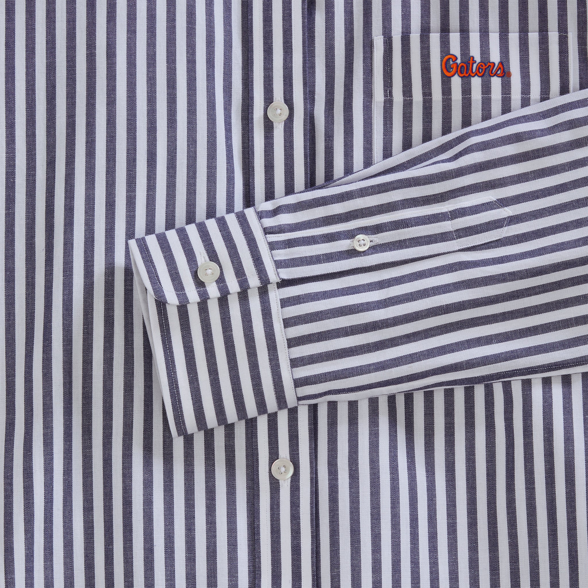 Navy and white striped women's poplin shirt with Gators embroidery, button details. Class Trip | Officially Licensed Collegiate Apparel