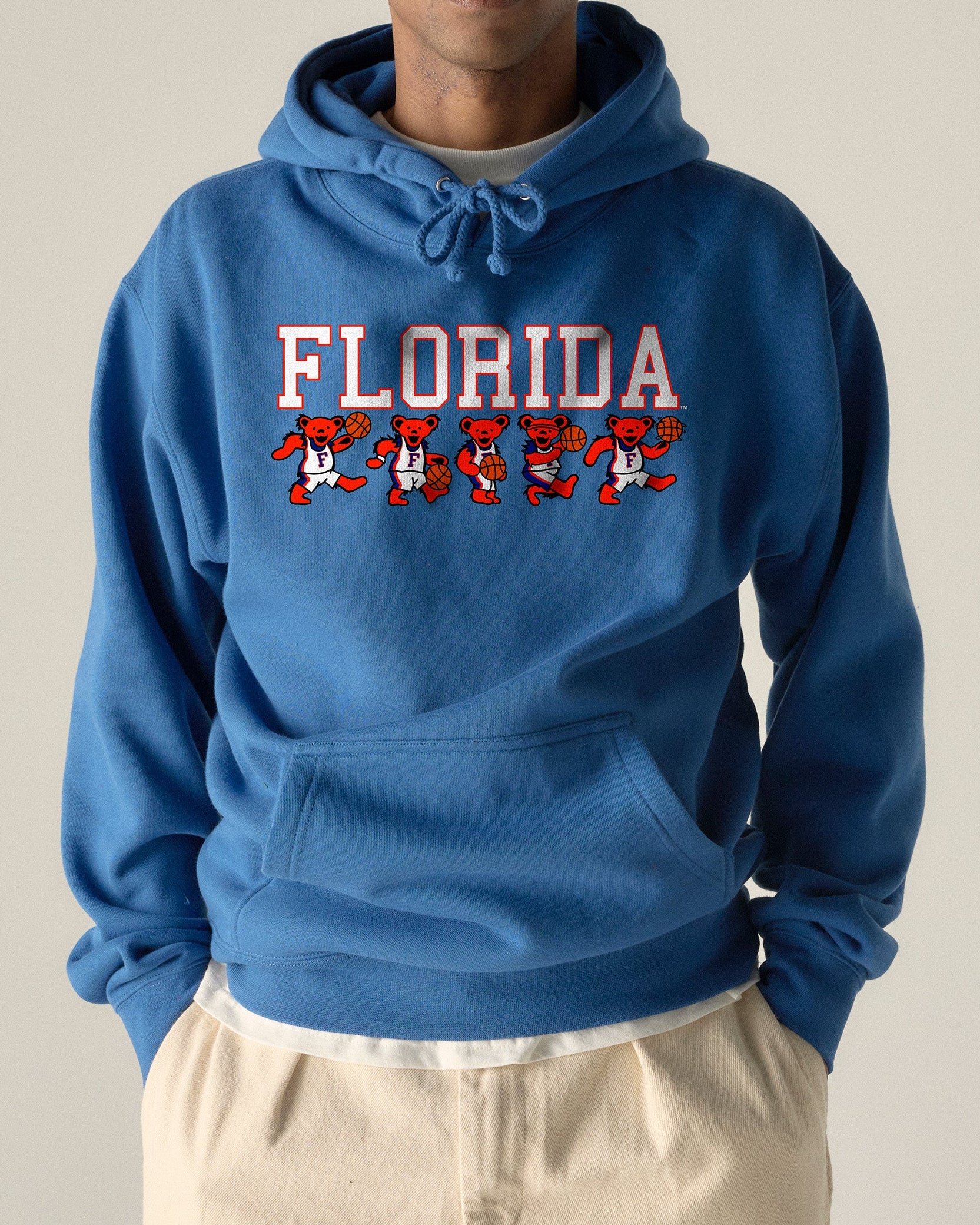 Blue Florida hoodie featuring cartoon basketball bears, collegiate style. Class Trip | Officially Licensed Collegiate Apparel