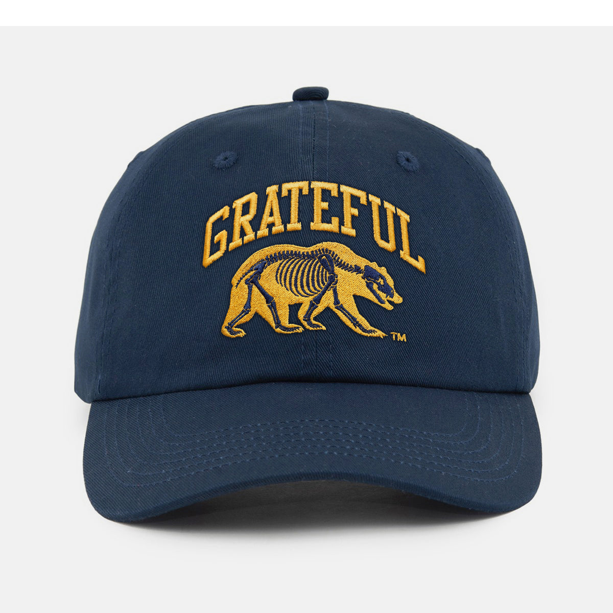 Front view of the Navy Cal Berkeley x Grateful Dead Skeleton Bear Dad Hat. Class Trip | Higher Education