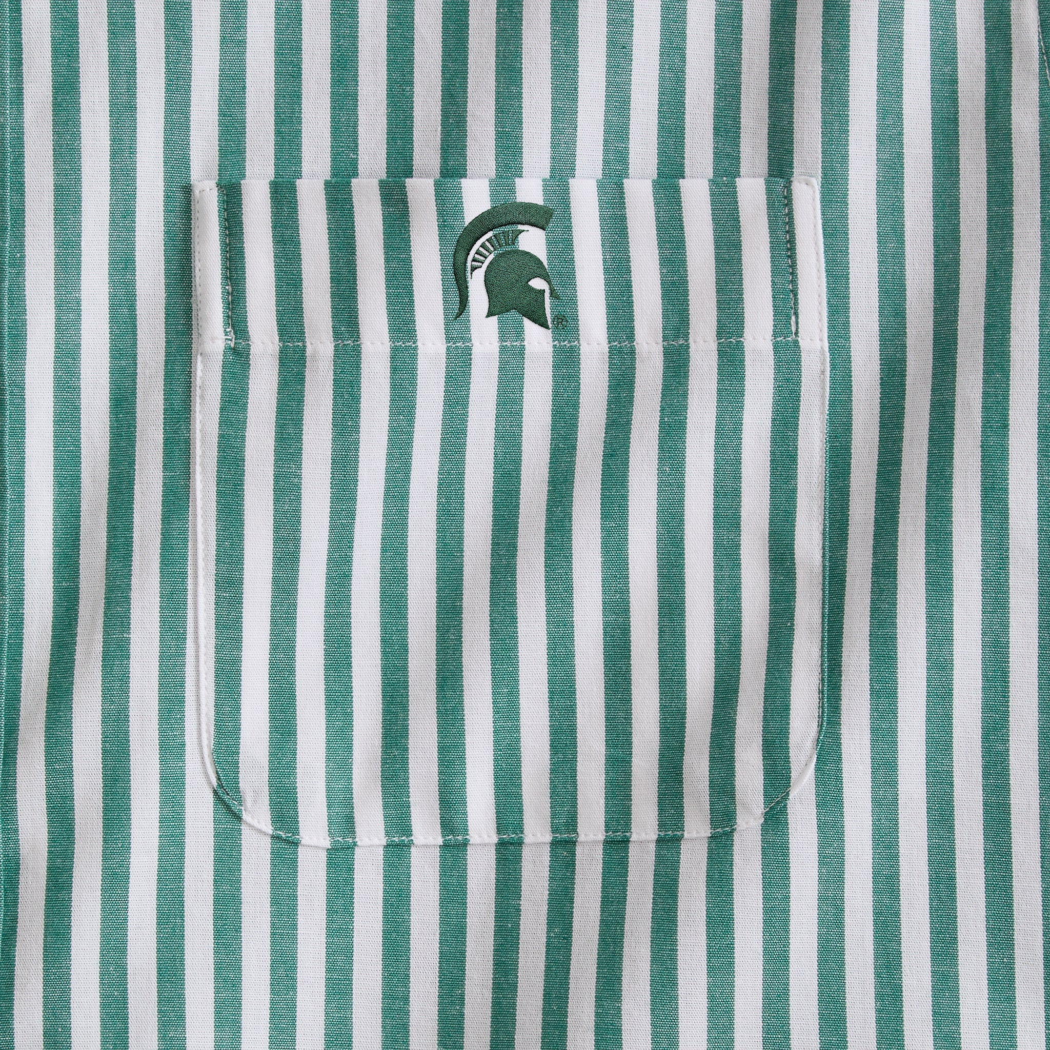 Green and white striped men's shirt pocket with embroidered Spartan helmet logo. Class Trip | Officially Licensed Collegiate Apparel