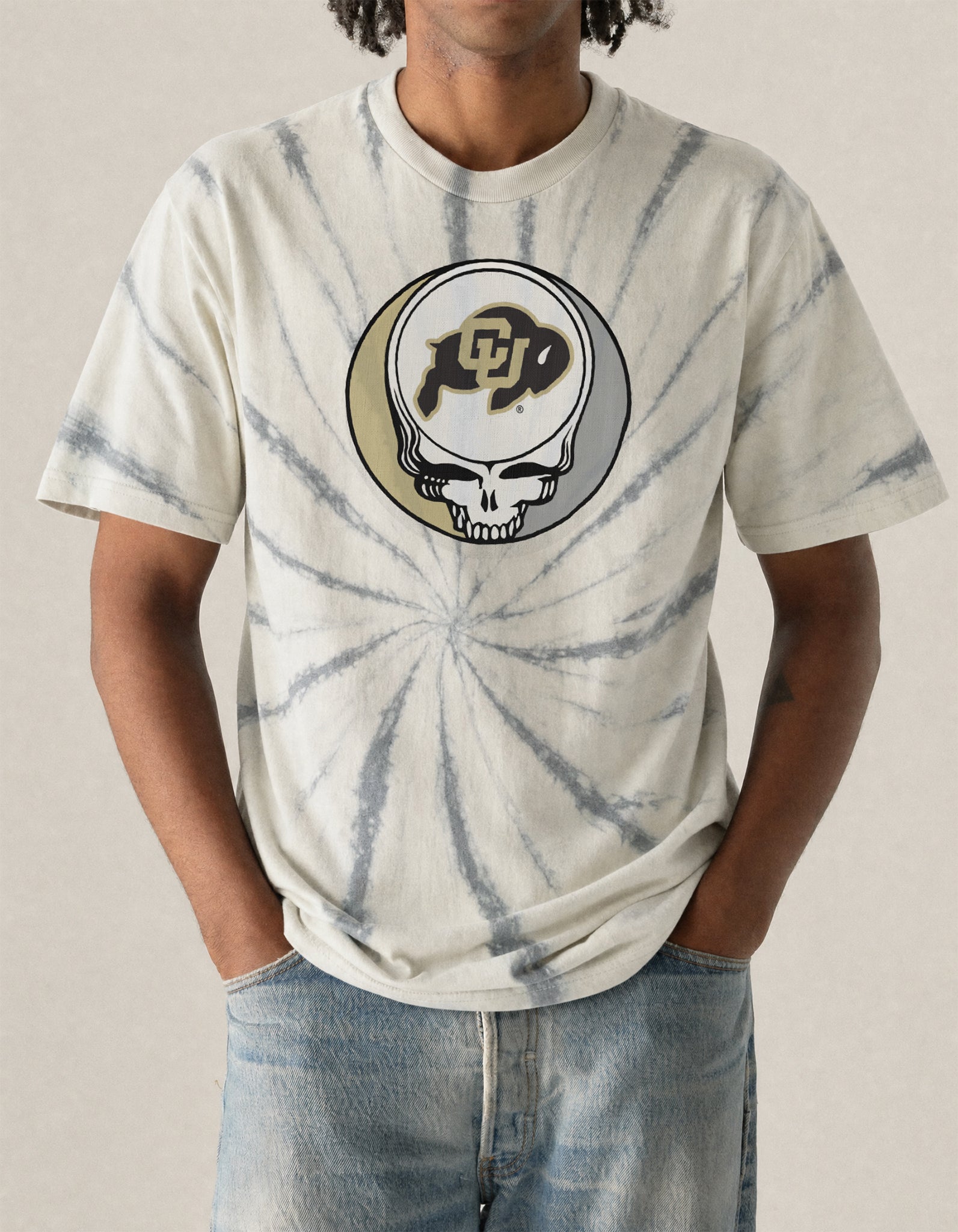 Cream tie-dye tee with Grateful Dead skull and CU Buffaloes logo, vintage college apparel. Class Trip | Higher Education