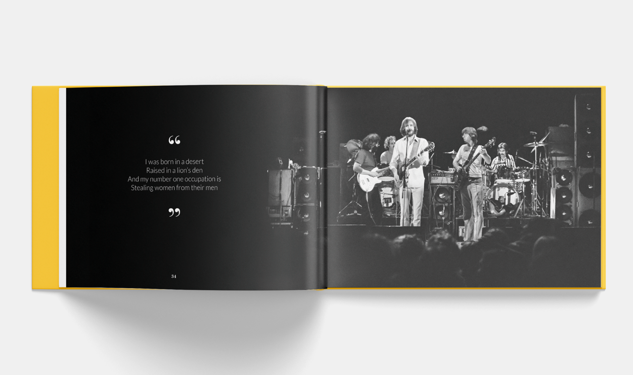 Vintage band performing live on stage, black and white photo in open book with quote. Class Trip | Officially Licensed Collegiate Apparel