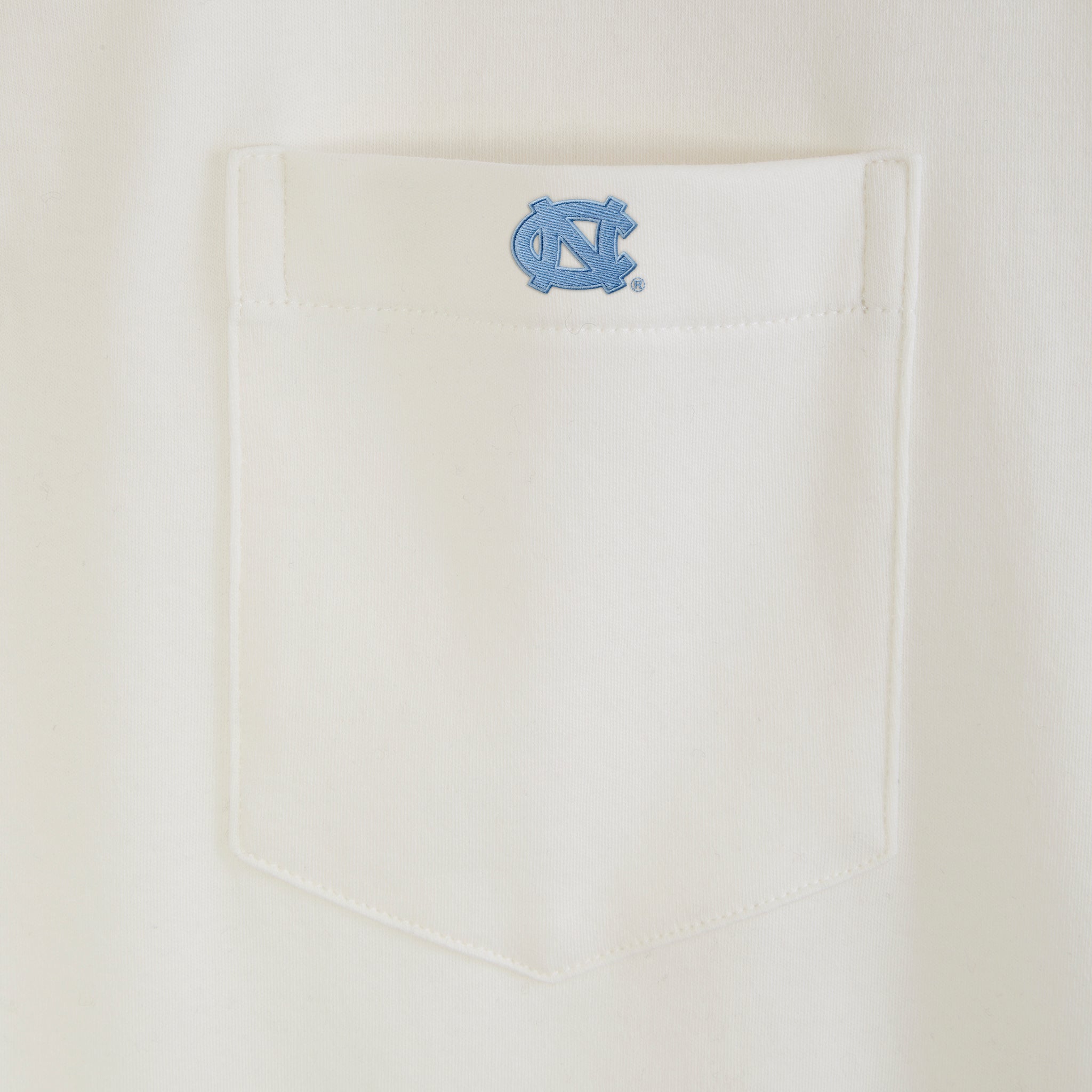 Cream t-shirt pocket with embroidered UNC logo, Class Trip | Officially Licensed Collegiate Apparel