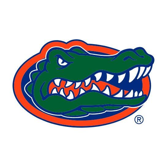 Florida Gators logo with green alligator head, orange and blue outline. Class Trip | Officially Licensed Collegiate Apparel