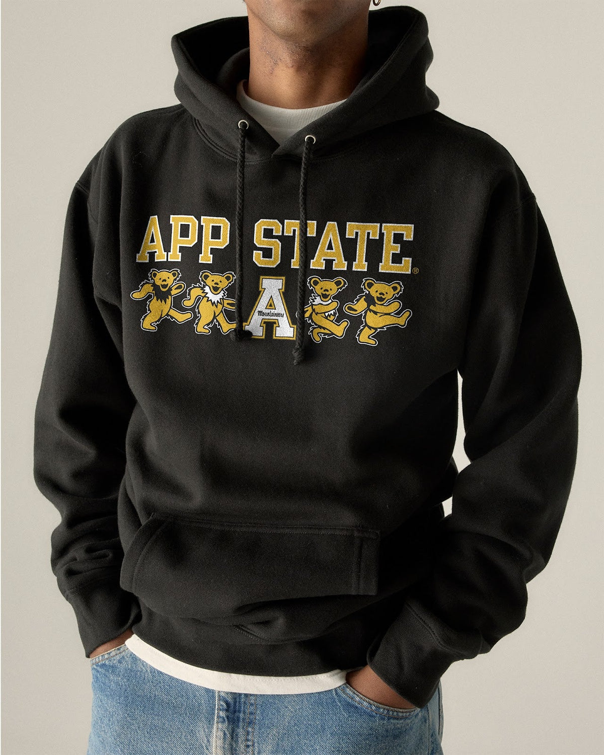 Model wearing the Black Appalachian State x Grateful Dead Mascot Bears Hoodie, front view. Class Trip | Higher Education