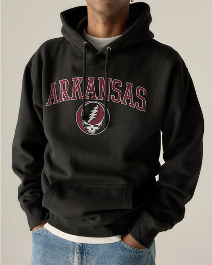 Model wearing the Black Arkansas x Grateful Dead Arch SYF Hoodie, front view. Class Trip | Higher Education