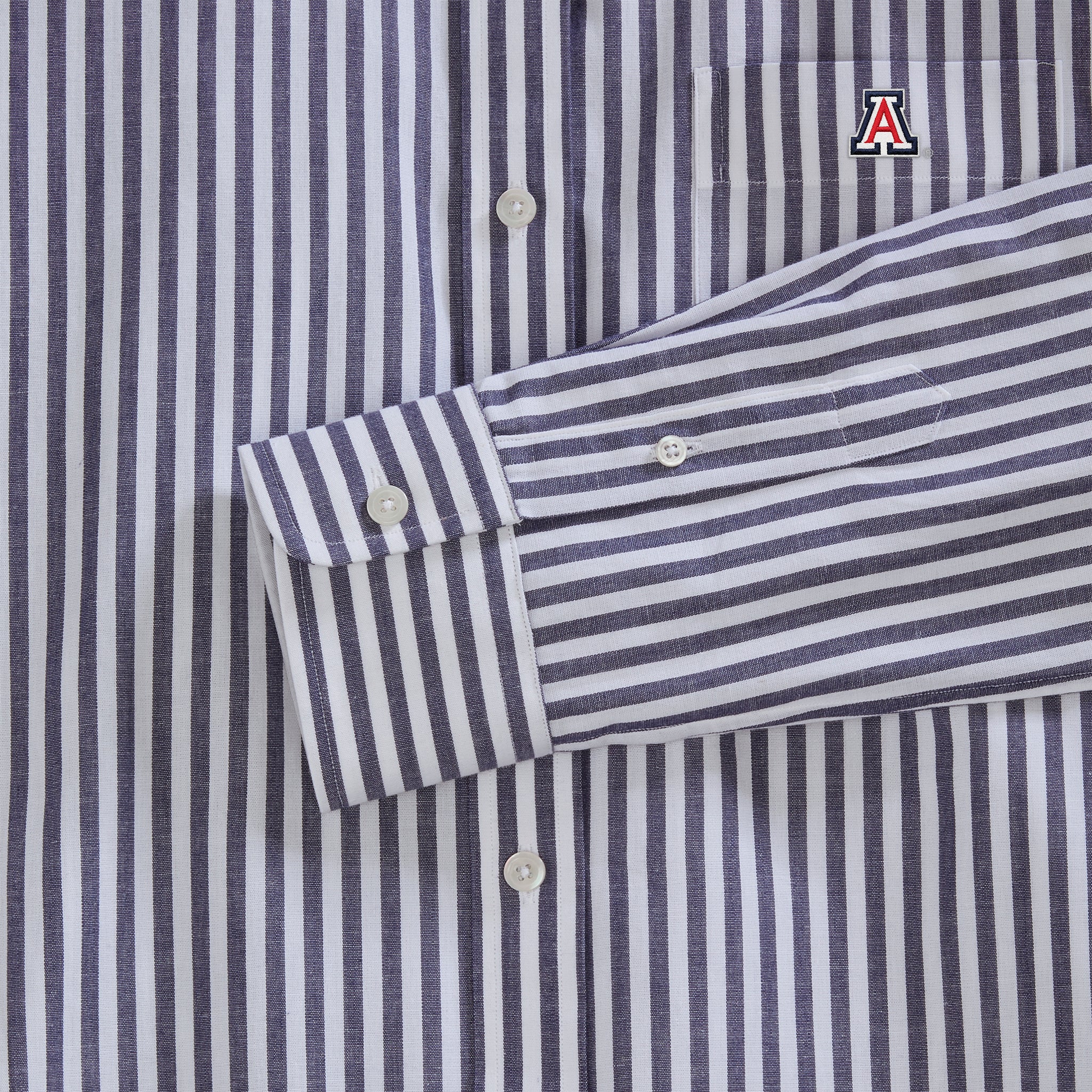 Navy striped women's poplin shirt with embroidered collegiate A logo on pocket. Class Trip | Officially Licensed Collegiate Apparel