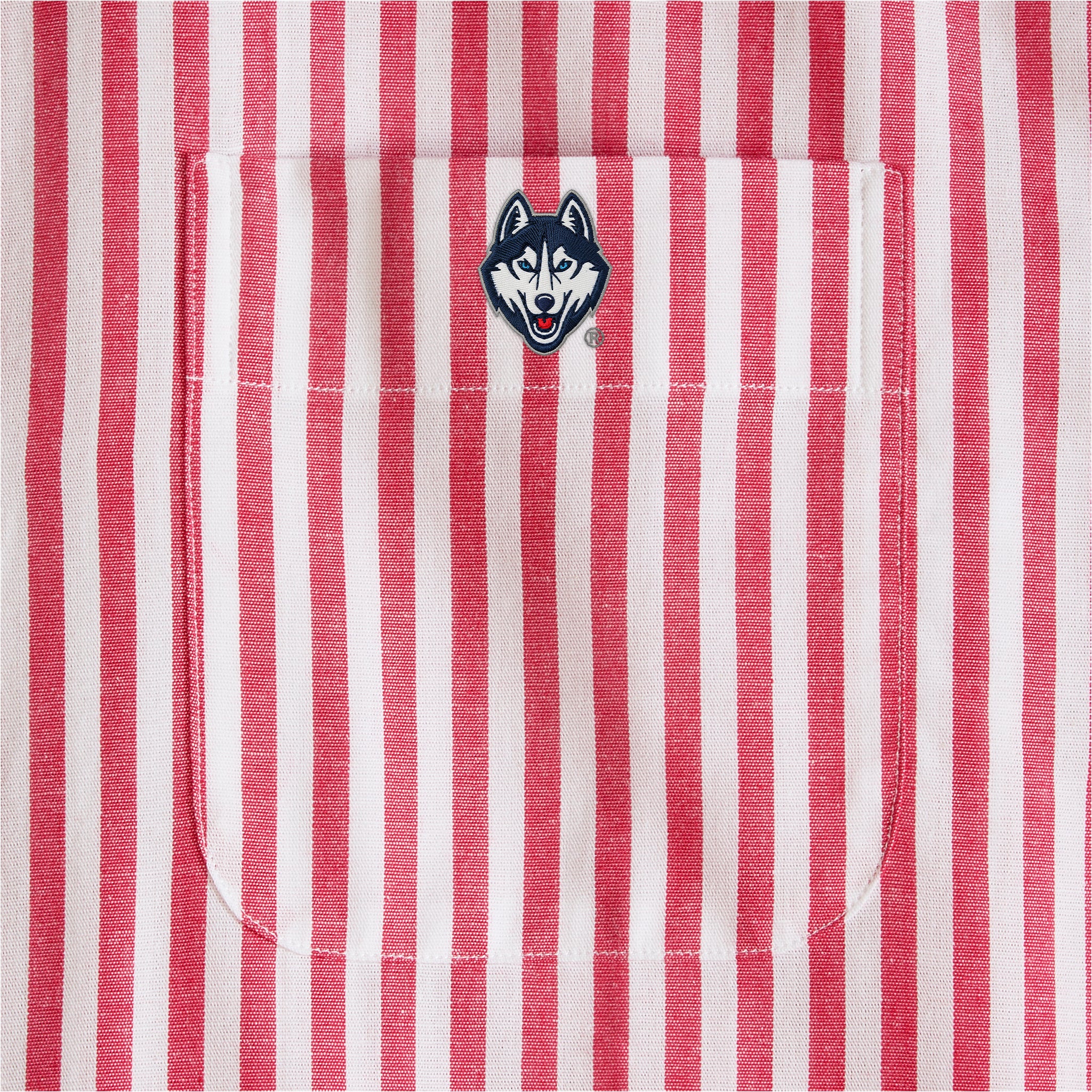Red and white striped women's poplin shirt pocket with embroidered husky logo. Class Trip | Officially Licensed Collegiate Apparel