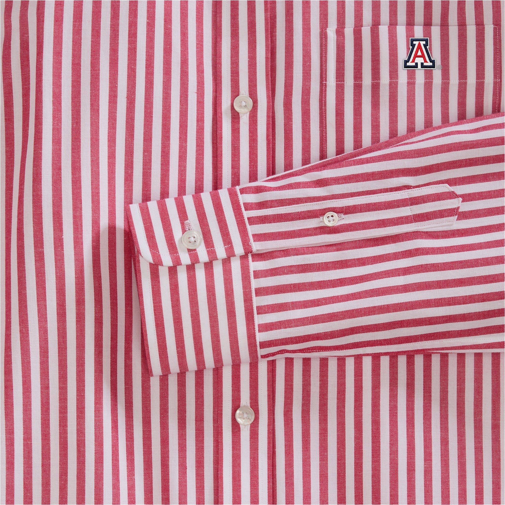 Red and white striped poplin women's shirt with embroidered collegiate logo on pocket. Class Trip | Officially Licensed Collegiate Apparel