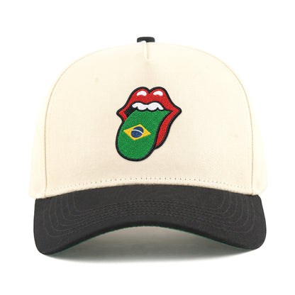 Cream and black baseball cap with embroidered Rolling Stones lips logo featuring Brazilian flag tongue. Class Trip | Higher Education