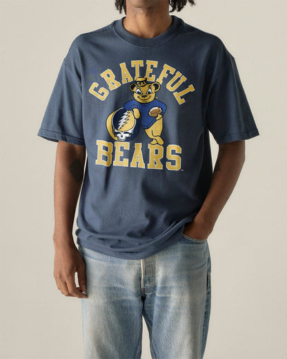 Model wearing the Navy Cal Berkeley x Grateful Dead Grateful Bears Tee, front view. Class Trip | Higher Education