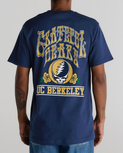 Model wearing the Navy Cal Berkeley x Grateful Dead Berkeley Steal Your Face Tee, back view. Class Trip | Higher Education
