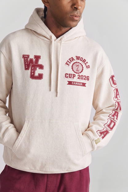 Cream hoodie with FIFA World Cup 2026 Canada graphics, vintage college style. Class Trip | Higher Education