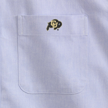 Oxford blue men's shirt pocket with embroidered collegiate buffalo logo. Class Trip | Officially Licensed Collegiate Apparel