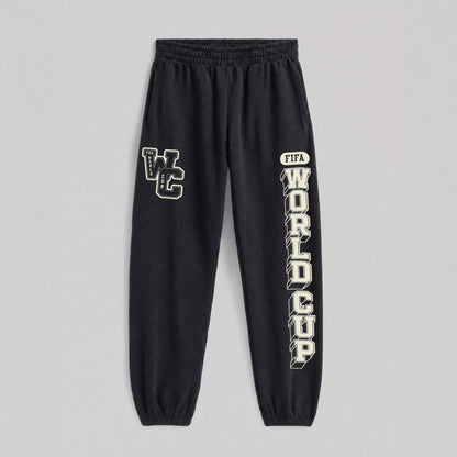Black FIFA World Cup sweatpants with vintage graphic print on legs. Class Trip | Higher Education