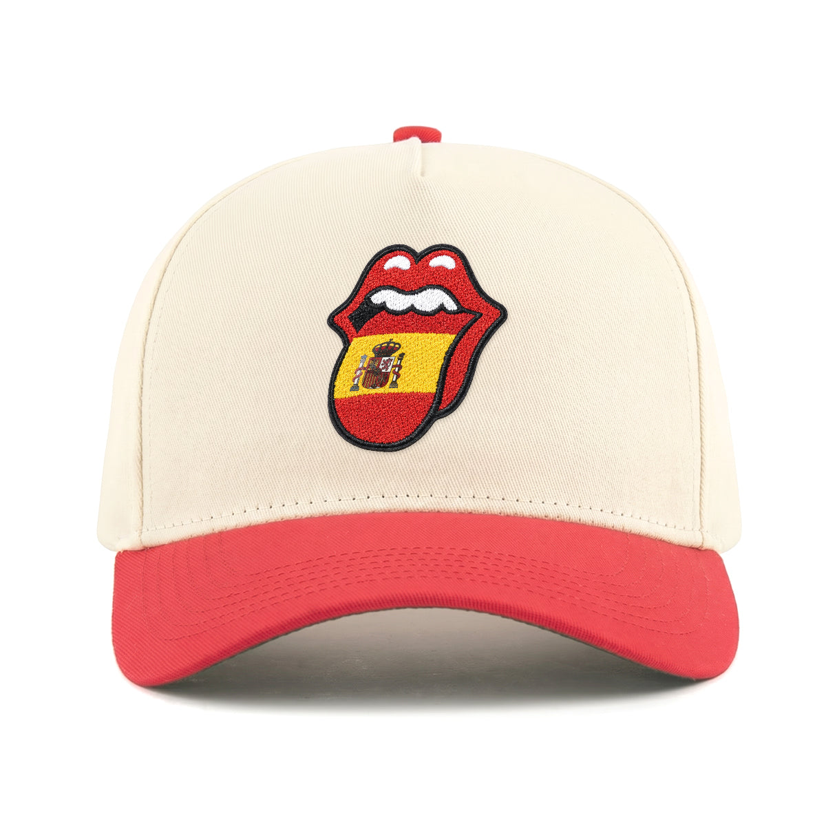 Cream and red baseball cap with embroidered Spanish flag tongue logo. Class Trip | Higher Education