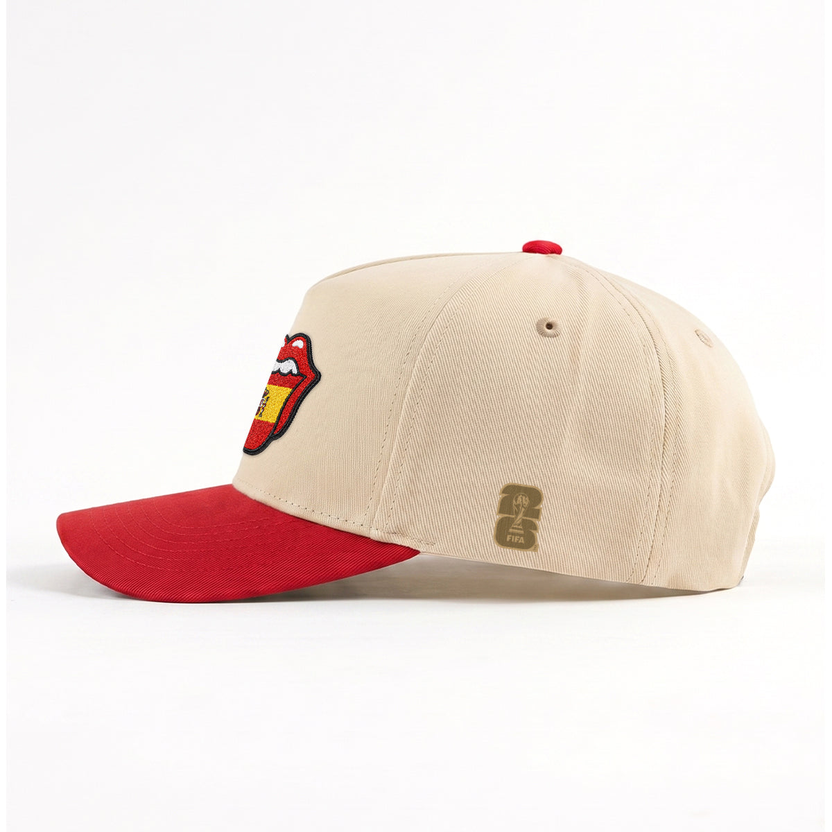 Beige and red cap with Rolling Stones tongue logo and FIFA patch, Class Trip | Higher Education
