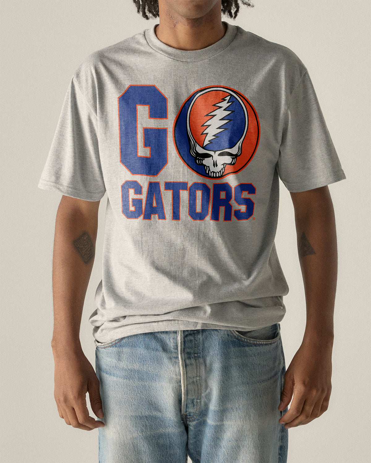 Grey t-shirt with Grateful Dead and Go Gators graphic. Florida x Grateful Dead Go Gators Tee Class Trip | Higher Education