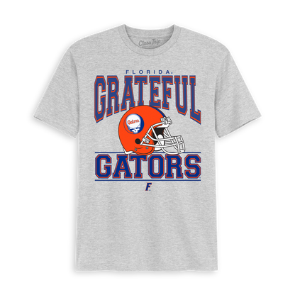 Grey t-shirt with Florida Gators helmet and Grateful Dead style text. Florida x Grateful Dead Steal Your Helmet Tee Class Trip | Higher Education