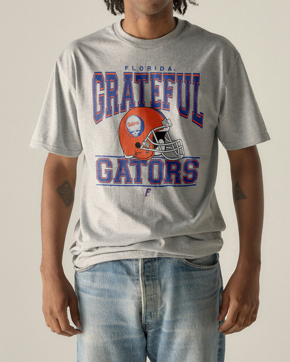 Gray Florida Gators t-shirt with vintage graphic and helmet. Florida x Grateful Dead Steal Your Helmet Tee Class Trip | Higher Education