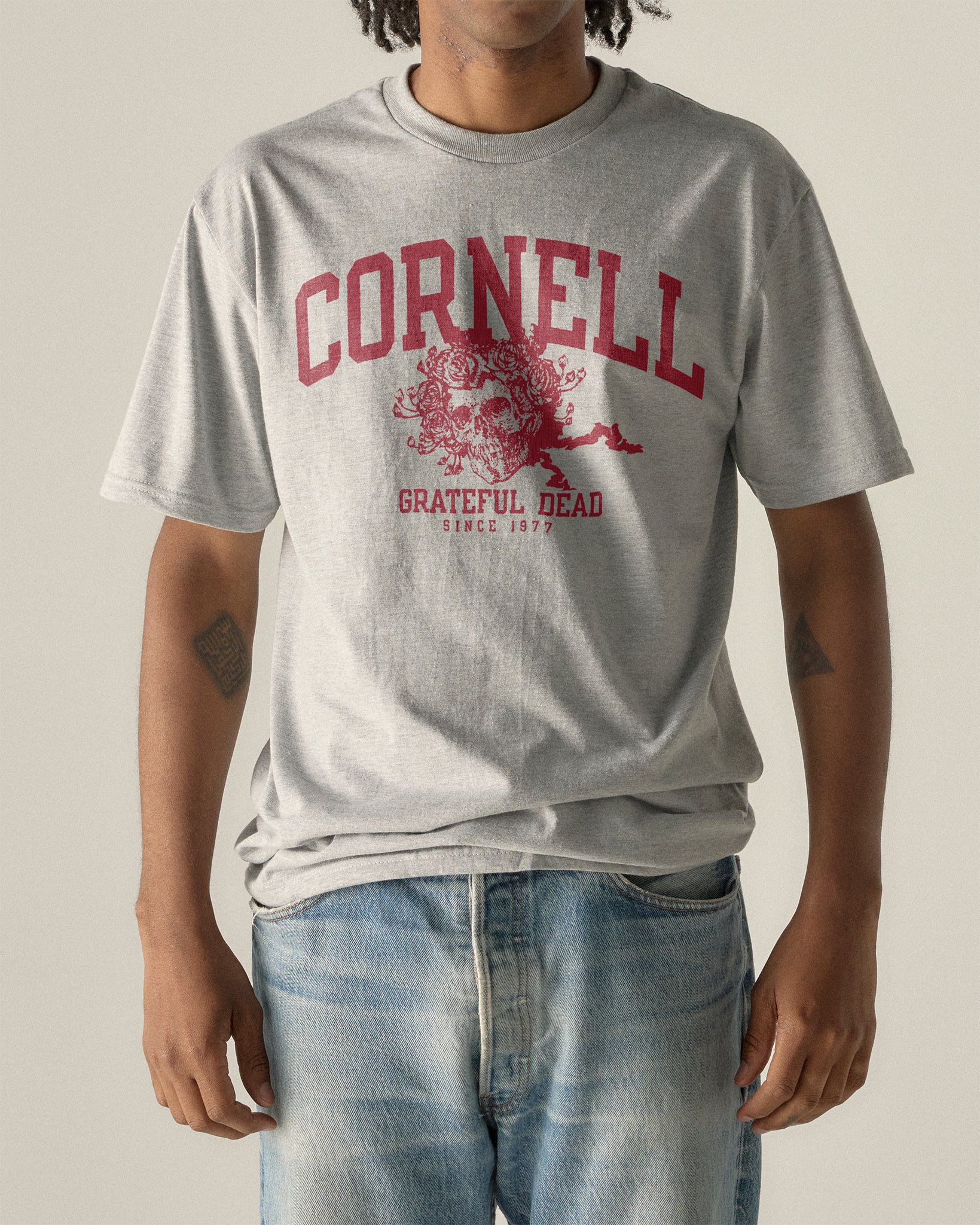 Cornell Grateful Dead vintage tee with skull and roses graphic, gray crew neck t-shirt. Cornell Grateful Dead Since 1977. Class Trip | Officially Licensed Collegiate Apparel