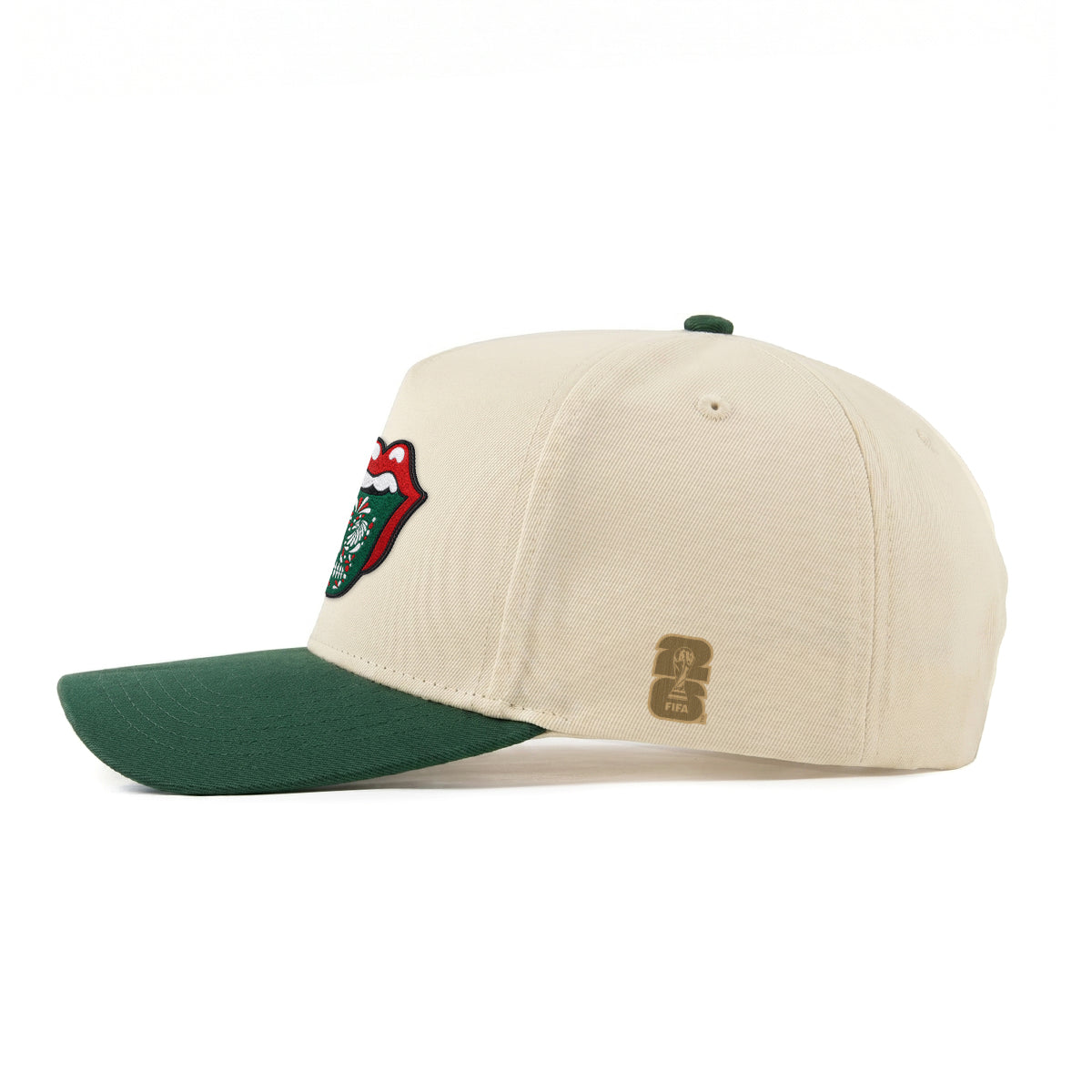 Cream and green baseball cap with embroidered Rolling Stones tongue logo and FIFA patch. Class Trip | Higher Education