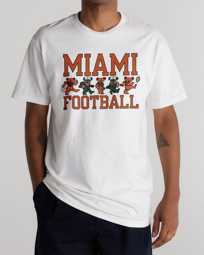 White Class Trip t-shirt featuring Miami Football with Grateful Dead bears. University of Miami x Grateful Dead Football Bears Tee Class Trip | Higher Education