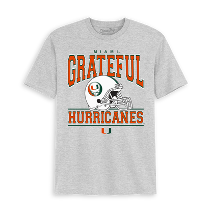 Grey University of Miami tee with 'GRATEFUL HURRICANES' text and helmet. University of Miami x Grateful Dead Steal Your Helmet Tee Class Trip | Higher Education