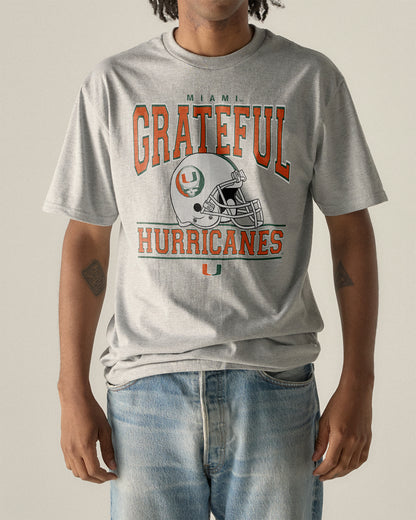 Grey University of Miami x Grateful Dead tee with helmet graphic. University of Miami x Grateful Dead Steal Your Helmet Tee Class Trip | Higher Education