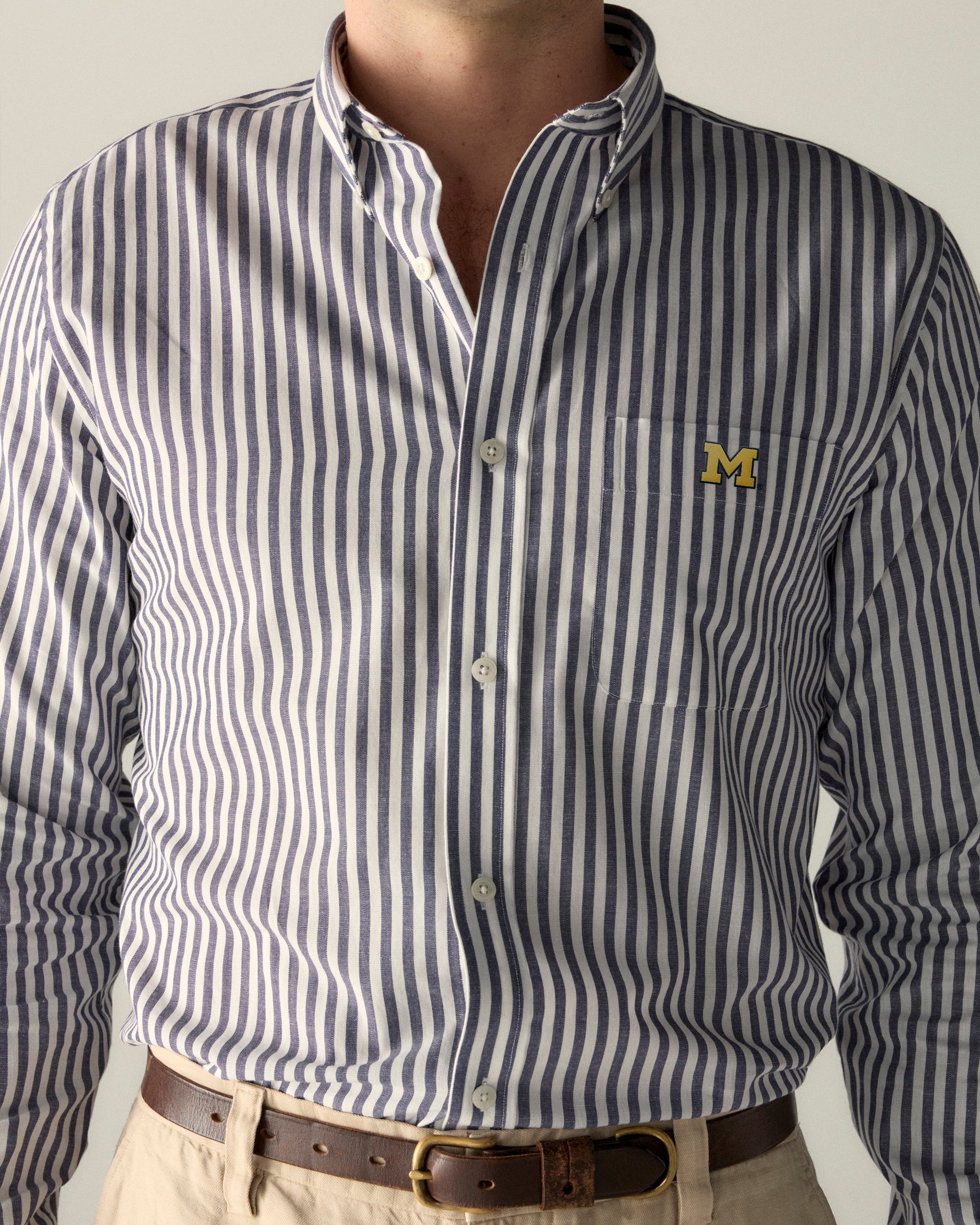 Men's navy and white striped poplin button-up shirt with collegiate logo on pocket, Class Trip | Officially Licensed Collegiate Apparel