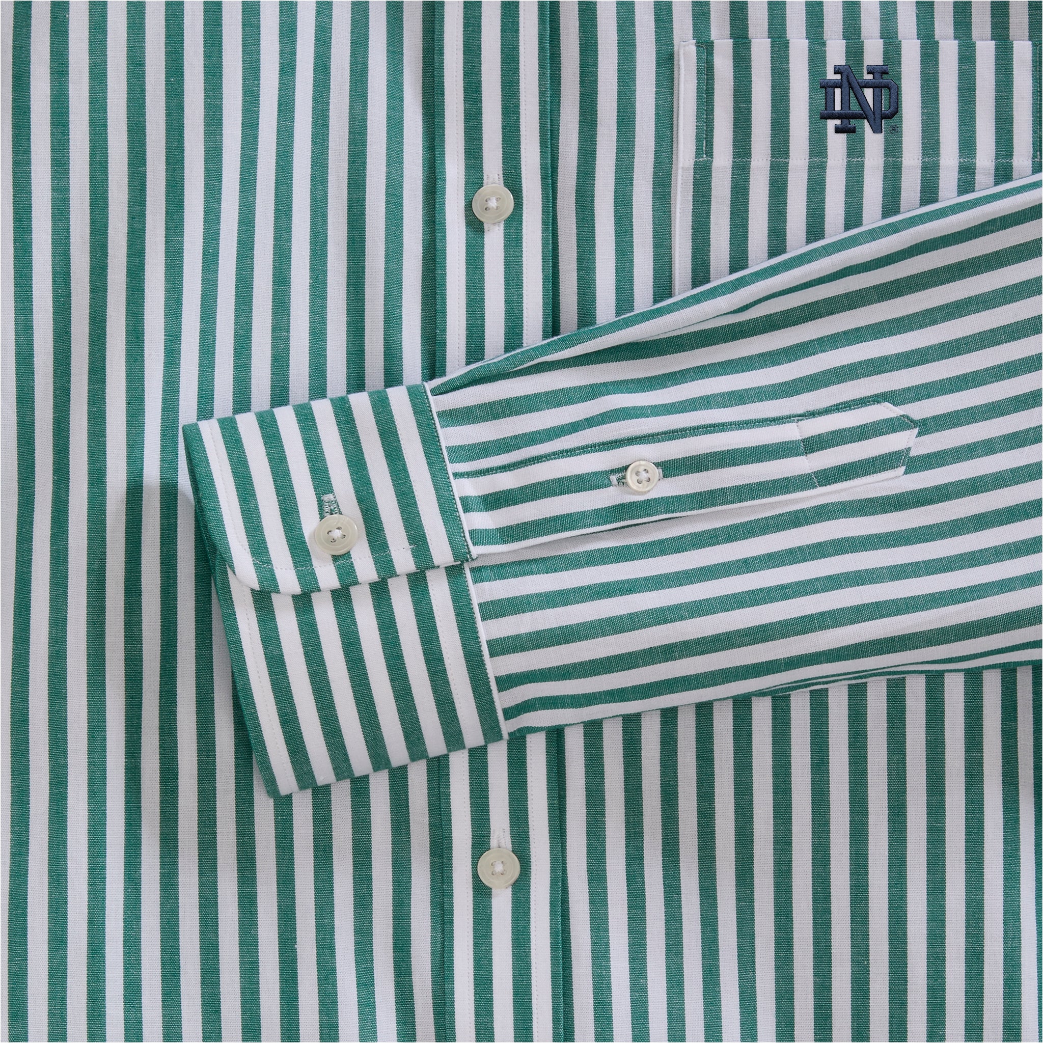 Green and white striped poplin shirt with embroidered collegiate logo detail, button cuff. Class Trip | Officially Licensed Collegiate Apparel