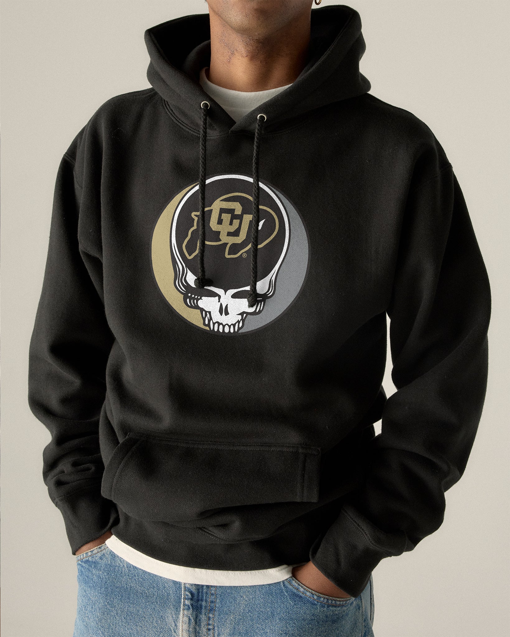 Black hoodie with Colorado Buffaloes Grateful Dead skull logo, college apparel. Class Trip | Higher Education