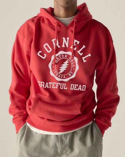 Red Cornell Grateful Dead hoodie with Bartón Hall Ithaca NY graphic, vintage collegiate style. Cornell Grateful Dead Hoodie | Class Trip | Officially Licensed Collegiate Apparel