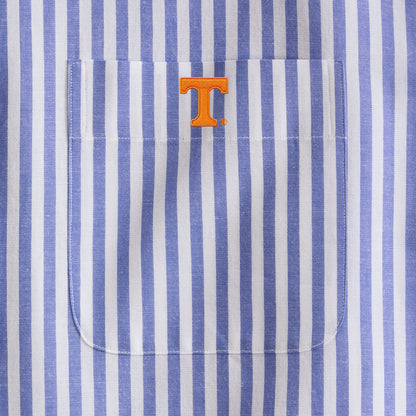 Close-up of blue and white striped men's shirt pocket with orange collegiate logo, Class Trip | Officially Licensed Collegiate Apparel