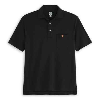 Black collegiate polo shirt with front pocket and orange letter T logo, short sleeves. Class Trip | Officially Licensed Collegiate Apparel