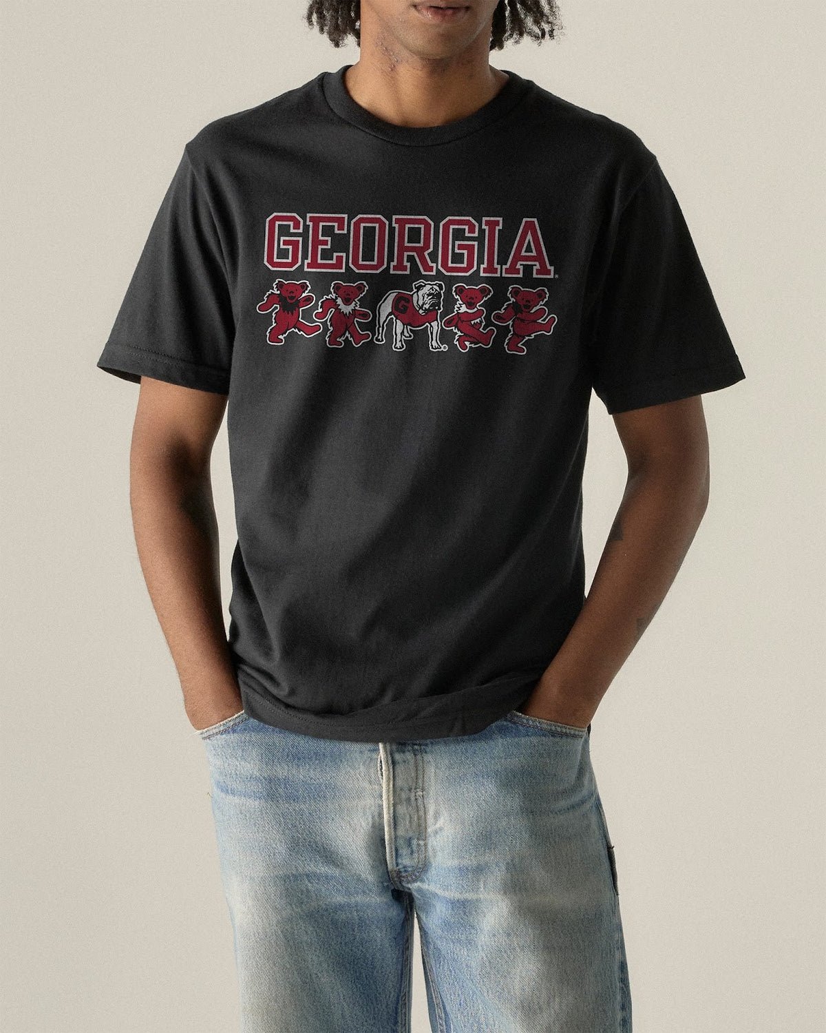 Model wearing the Black Georgia x Grateful Dead Mascot Bears Tee, front view. Class Trip | Higher Education
