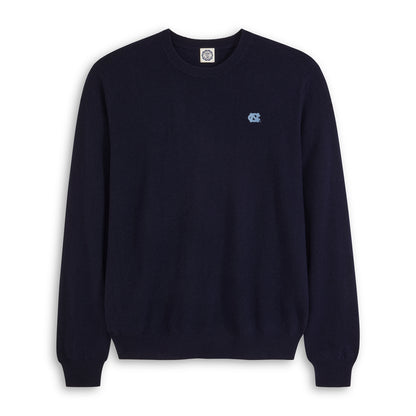 Men's navy merino wool sweater with UNC logo on chest, crewneck style. Class Trip | Officially Licensed Collegiate Apparel