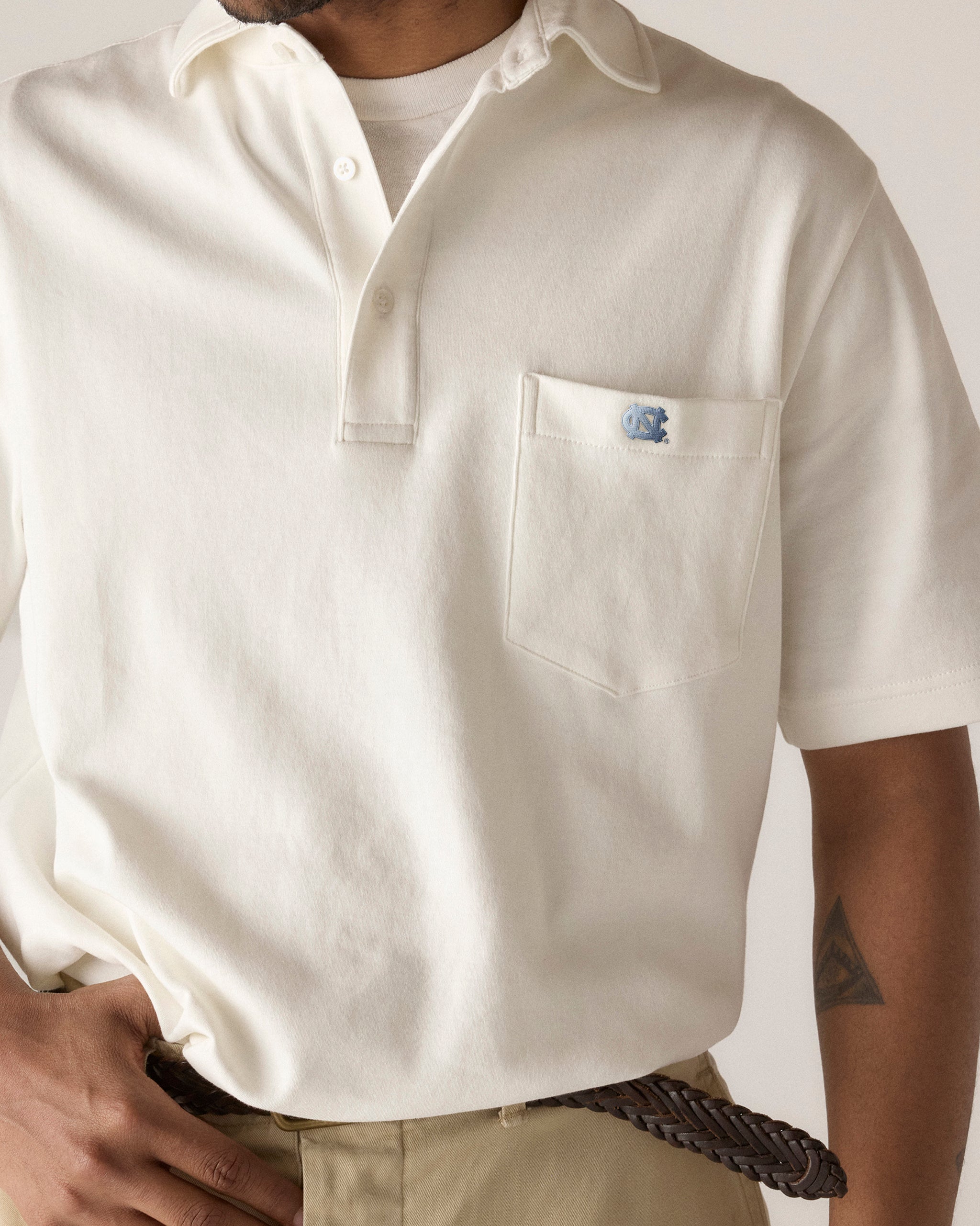 Cream UNC polo shirt with embroidered logo, Class Trip | Officially Licensed Collegiate Apparel