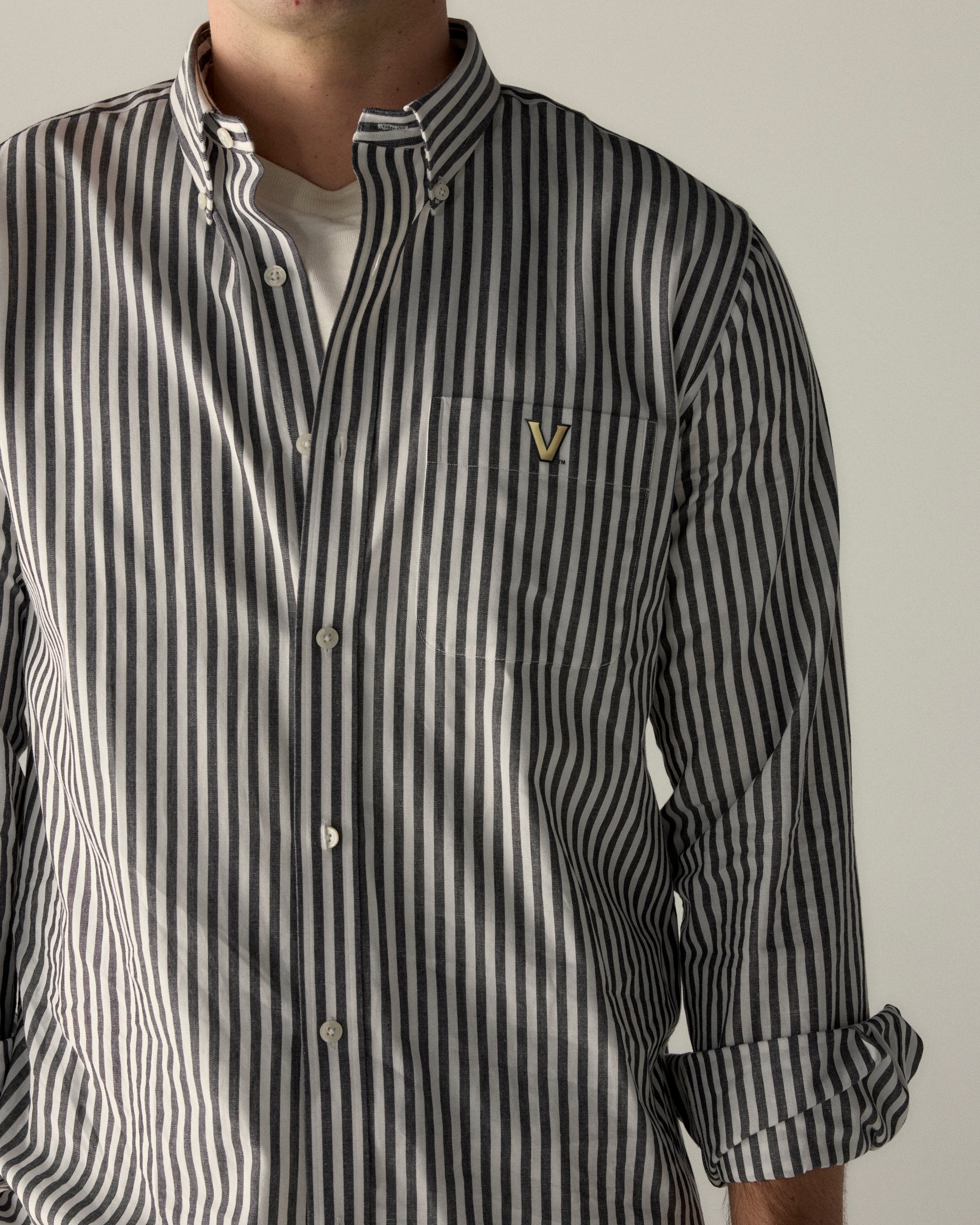 Men's black and white striped button-down poplin shirt with collegiate crest, Class Trip | Officially Licensed Collegiate Apparel