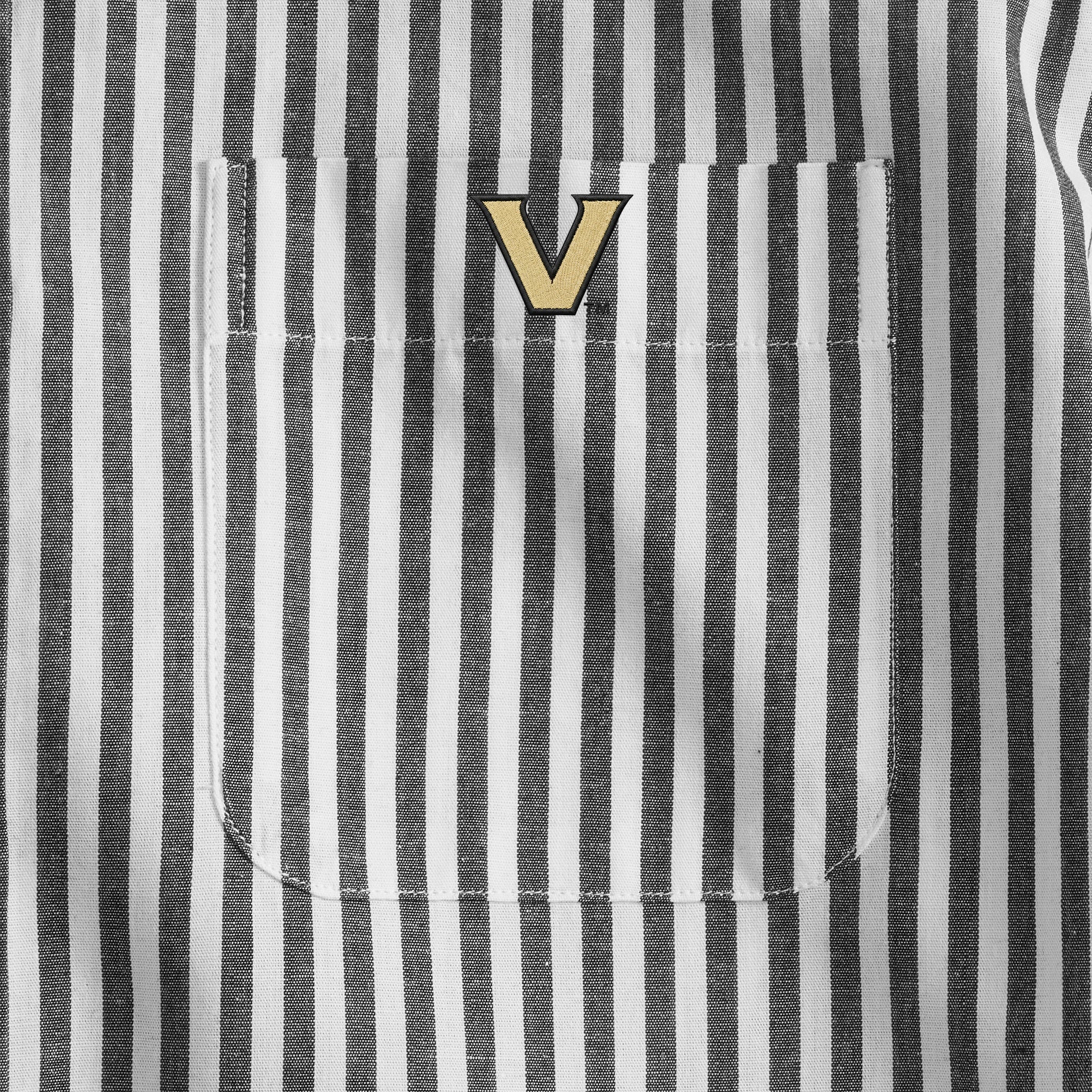 Men's black and white striped shirt pocket with gold V emblem. Class Trip | Officially Licensed Collegiate Apparel